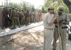 A police contingent outside the Jamia Millia campus, which was witness to clashes and incidents