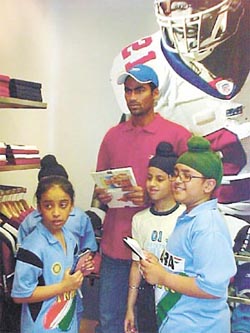 Mohammed Kaif with children at the Reebok showroom, which was inaugurated in G.K. Market