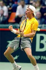 Australia's Lleyton Hewitt reacts after winning the first set