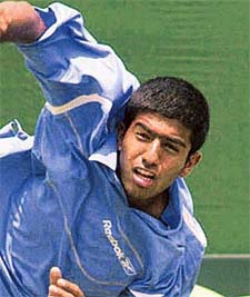 Indias Rohan Bopanna returns the ball during his singles Davis Cup match