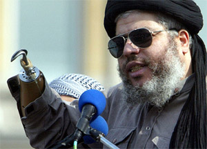 An August 25, 2002 file photograph shows radical Muslim cleric Sheikh Abu Hamza al-Masri addressing the sixth annual rally for Islam