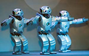 Sonys newly-developed small biped entertainment robots SDR-4X II show dancing ability at a press preview of Robodex 2003, 
