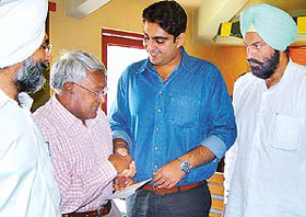 Shooter Manavjit Sandhu, silver medallist at the 2002 Asian Games being conferred with honorary membership of CGA Range 