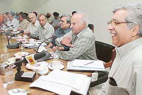 Prof G.S. Bhalla, Professor Emeritus, Jawaharlal Nehru University, New Delhi (second from right), makes a point during a seminar on crops diversification 