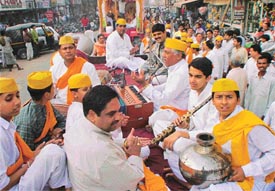 Devotees participate in a Ramnavmi procession
