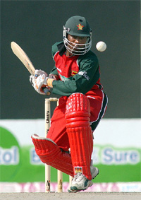 Zimbabwe's Tatenda Taibu hits a four 
