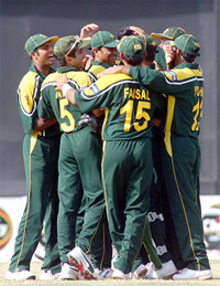 Jubilant Pakistanis celebrate the dismissal of Zimbabwe's Grant Flower 