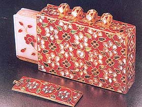 A 17th-century Mughal miniature Koran cover encrusted with precious stones