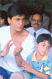 Shah Rukh Khan enjoys a cricket match with son Aryan
