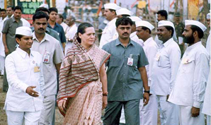 Congress President Sonia Gandhi is escorted by Seva Dal workers in Jabalpur