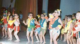 Dancing dolls: Students of Ryan International School present a dance at the annual day function held at Guru Nanak Dev Bhavan