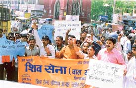 Activists of Shiv Sena take out a protest rally against some schools asking for donations to admit children