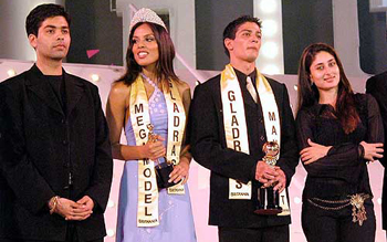 Deepti Gujral of Mumbai ( second from left ) and Muzamil Ibrahim of Jammu and Kashmir (second from right) , winners of the Britannia Gladrags Mega Model and Manhunt Contest-2003