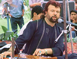Punjabi singer Hans Raj Hans performs during Baisakhi celebrations at Punjab Raj Bhavan in Chandigarh on Monday. 