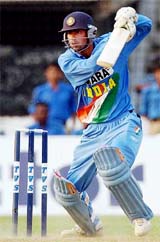 Mohammed Kaif caresses the ball through the covers for a four during Indias match against South Africa