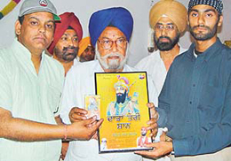 SGPC member Hardial Singh Brar (centre) releases a music album, Daata Teri Shaan, at Gurdwara Nadha Sahib, Panchkula, on Tuesday. 