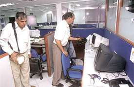 A bomb disposal squad searching the Vijaya building on Barakhamba Road