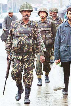 Security personnel patrol the roads of Srinagar on Wednesday as the security in Kashmir valley has been beefed up two days ahead of Prime Minister Atal Behari Vajpayees two-day visit.