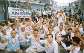 A group of hosiery manufacturers on a fast in protest against the levy of Central excise by the government