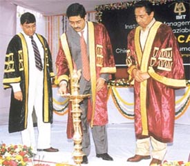 Mr Kumaramangalam Birla lighting the lamp at the convocation of IMT