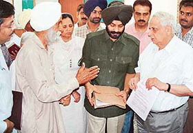 Families of terrorist victims meet Lieut-Gen J.F.R. Jacob (retd) at Punjab Raj Bhavan in Chandigarh on Friday.