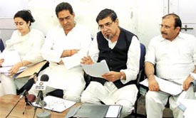 A mire of land scam: Congress leaders Kiran Chaudhary, Subhash Chopra, Jagdish Tytler and Ram Babu Sharma addressing a press conference