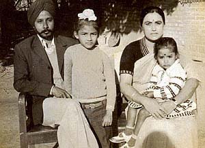 A Sikh family of Nowgaon district which has adopted the Assamese culture and dress code