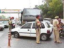 A scene of the accident that took place between a car and an Army truck which led to a traffic jam