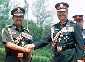 The Royal Nepalese Army chief, Gen Pyar Jung Thapa, welcomes his Indian counterpart, Gen Nirmal Chander Vij