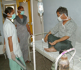 A person suspected to be suffering from SARS under treatment