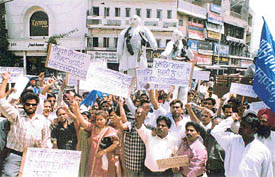 Activists of various Dalit organisations hold a demonstration against Samajwadi Party leaders