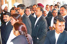 Advocate wait in a queue for casting votes during the Punjab & Haryana High Courts Court Bar Association 