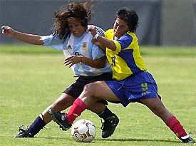 Natalia Gatti of Argentina fights for the ball with Colombias Sandra Valencia