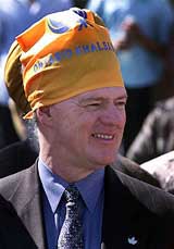 Mr John Manley, Canada's Deputy Prime Minister and Finance Minister, wears a handerkerchief to cover his head while watching Baisakhi celebrations in Misissaua, north-west of Toronto