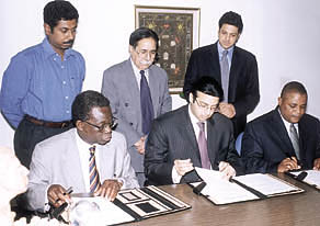 Amity and TEVETA officials sign an MoU on the training needs of the Zambian institutes