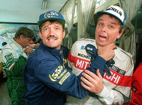 Undated file photograph of New Zealand rally driver Possum Bourne playfully throttling winner of Hong Kong Beijing Rally