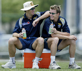 Australia's Andy Bichel and Brett Le joke during a break