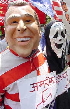 Activists of the Indian Federation of Trade Unions protest against capitalism