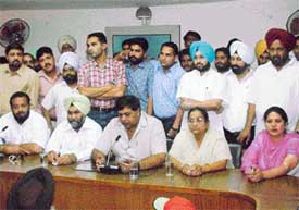 Mr Surinder Dawer addresses a workers meeting