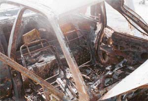The damage caused to a petrol-run car due to a short circuit in the engine