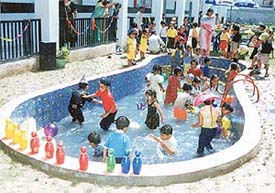 Children of Sanjay Public School, Sector 70, SAS Nagar, take cool dips to beat the heat, in the school swimming pool