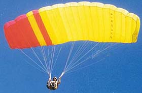 A paraglider soars in the sky