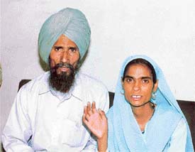 Mr Gurjit Singh and Ms Karamjit Kaur, son and daughter-in-law of Puran Singh