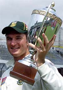 South African skipper Graeme Smith holds the championship trophy