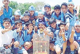 Jubilant players of Guru Nanak Public School, Sector 36, who won the Chandigarh Sub-junior Football Championship 