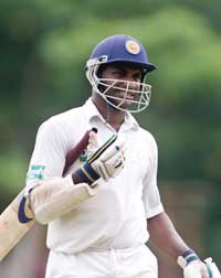Sri Lankan batsman Sanath Jayasuriya returns to the pavilion after being dismissed for 82 