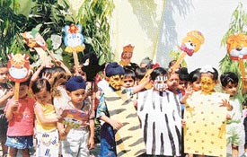Tiny tots of Lovely Nursery Play School during a jungle party