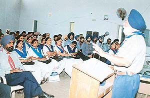 Mr Mahinder Singh Purba, resource person, addresses trained scouts on the concluding day of the three-day orientation programme on Friday.