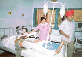 Persons injured in the Khud Mohalla fire in the old city of Ludhiana