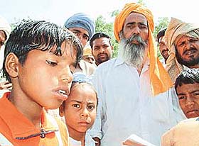 Nachhatar Singh (extreme left) had to drop out of school as his familys mined field was not generating much income